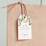 Coastal Watercolor Oyster Wedding Willkommen Geschenkanhänger<br><div class="desc">Diese Hochzeitsmarken an der Küste sind mit Soft Creme und Aqua Aqua Aqua Oyster und Perlen Illustrationen, mit Shucks, wir sind froh, dass Sie hier sind" in klassisch marineblau Buchstaben. Ideal für Hochzeiten am Strand, im Sommer oder im Wassersport, personalisieren Sie diese Tags mit Ihren Initialen und dem Hochzeitstag, und...</div>