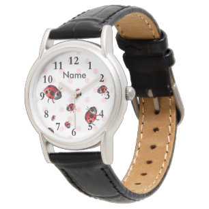 Coccinelles et montre-bracelet de pois
