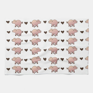 Cochon rose et serviette de toilette du coeur