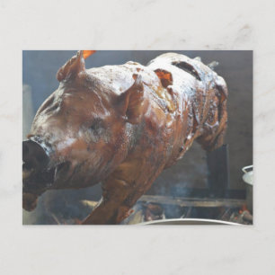 Cochon sur une carte postale crache