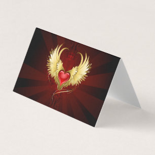 Coeur rouge avec ailes d'or