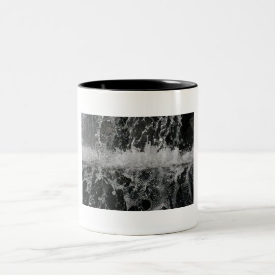Coffe Tasse mit einem Spritzen