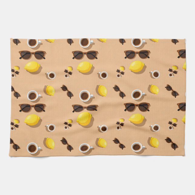 Coffee lemons and sunglasses on a warm sand geschirrtuch (Horizontal)