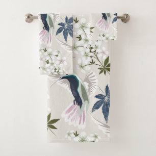 Colibris et fleurs blanches.
