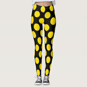 Collants à pois jaunes sur fond noir