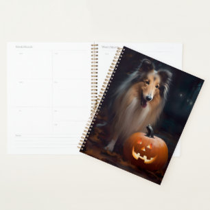 Collie à poil long d'Halloween avec citrouilles ef