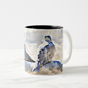 Colombes dans la tasse de café de cieux/tasse