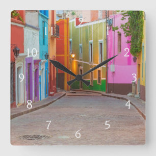Colorful street scene quadratische wanduhr