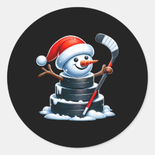 Comic-Eishockey-Puck-Schneemann mit Weihnachtsmann Runder Aufkleber