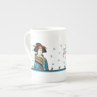 Conception japonaise de dame, tasse de porcelaine