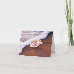 Conque Shell sur la carte de note de plage