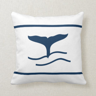 Conte de baleine bleue sur le coussin blanc