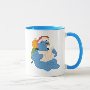 Cookie Monster liest eine Karte Tasse