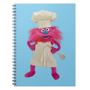 Cookie's Monster Food Truck Gonger posiert Notizblock