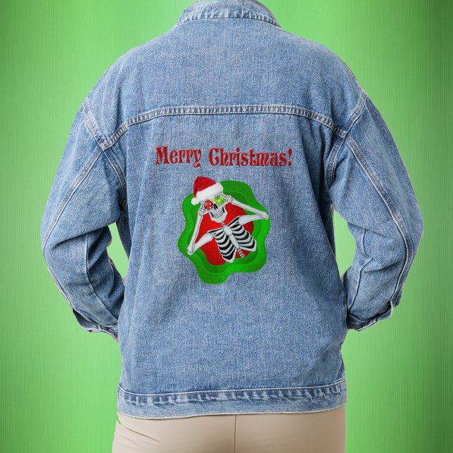 Cool Joyeux Noël Squelette Oeil d'ornement (Goofy skeleton ornament eyes Santa hat in splatter shape with Merry Christmas text on denim jacket.)