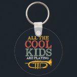 Coole Kinder spielen Trompete Funny Marching Band Schlüsselanhänger<br><div class="desc">Funny Trompet Player Design für diejenigen,  die Messing musical Instrument in einer Musikband,  Orchester oder musikalische Aufführung spielen. Coole Vintage Retro Jazz Musikgenuss für Musiker und Marching Bandmitglied. Ideal für Musiklehrer,  Orchesterfans und diejenigen,  die Liebe haben Trompete zu spielen. Großartiges Weihnachtsgeschenk und Geburtstagsgeschenk für Familien und Freunde.</div>