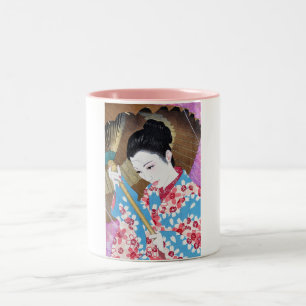 Coole orientalische japanische klassische Frau mit Zweifarbige Tasse