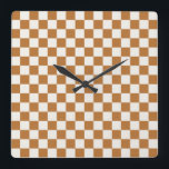 Copper and eggshell checkerboard pattern quadratische wanduhr<br><div class="desc">A brown and white checkerboard pattern fills the image. The square tiles are evenly spaced,  creating a uniform and orderly geometric design.</div>