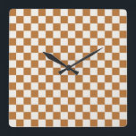 Copper and eggshell checkerboard pattern quadratische wanduhr<br><div class="desc">A brown and white checkerboard pattern fills the image. The square tiles are evenly spaced,  creating a uniform and orderly geometric design.</div>