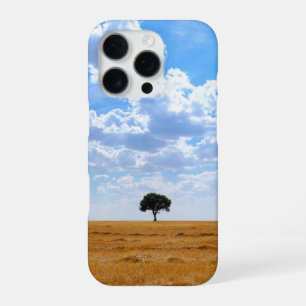 Coque iPhone 16 Pro Arbre dans un champ de blé récolté