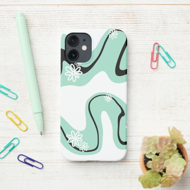 Coque iPhone Daisy Groove en vert, noir et blanc (Sur le bureau)