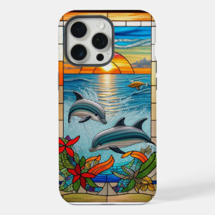 Dauphins sautant au coucher du soleil sur l'océan