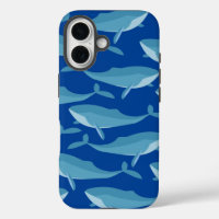 Banc de baleines nageant bleu foncé
