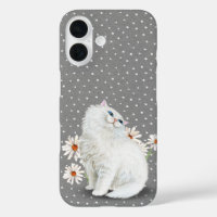 Chat et marguerites persanes blancs