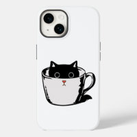Chaton noir avec nez rouge caché dans une tasse