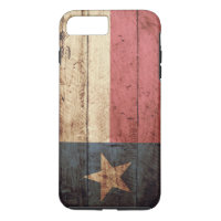 Drapeau d'état du Texas sur le vieux grain en bois