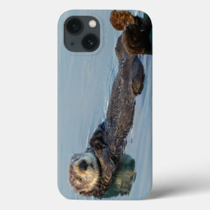 Coques Pour iPhone Loutre de mer flottant sur le dos dans l'océan