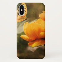Papillon orange et fleurs