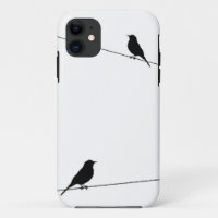 Silhouettes d'oiseau sur le fil