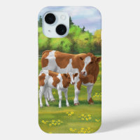 Vache de Guernesey et veau mignon dans les pâturag