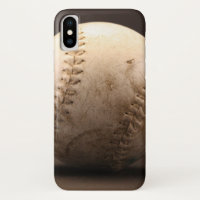 Vieux baseball en cuir avec piqûres