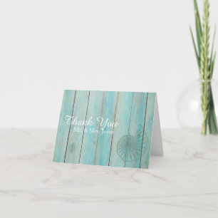 Coquillage bleu sur le Merci en bois de mariage de