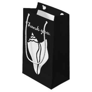 Coquillages d'été en sac cadeau noir