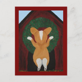 Corgi hängt Weihnachtskranz an das Hundehaus Postkarte