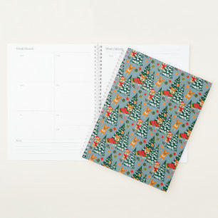 Corgis zieren den Weihnachtsbaum im Wald Planer