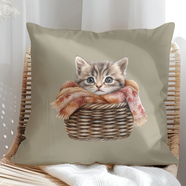 Cosy Basket Cat Pillow - Olive Taupe Edition Kissen (Cozy Basket Cat Pillow – Olive Taupe Edition in a sunny boho rattan chair.)