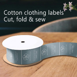 Cotton-Logo weiß auf dusus-blauem Bekleidungslabel Satinband