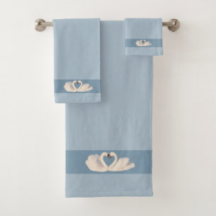 Couple de cygnes sur des nuances bleues merveilleu