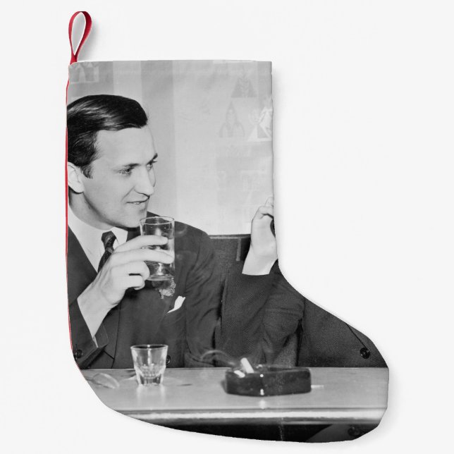 Couple sitting together in a restaurant flirting w kleiner weihnachtsstrumpf (Vorderseite)