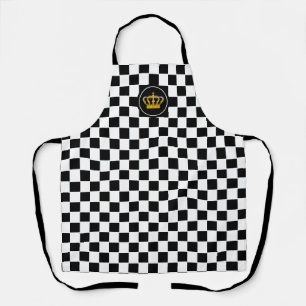 Couronne dorée sur tablier à motif d'échiquier noi