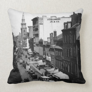 Coussin 1859 :  Le trafic et magasins sur la rue de