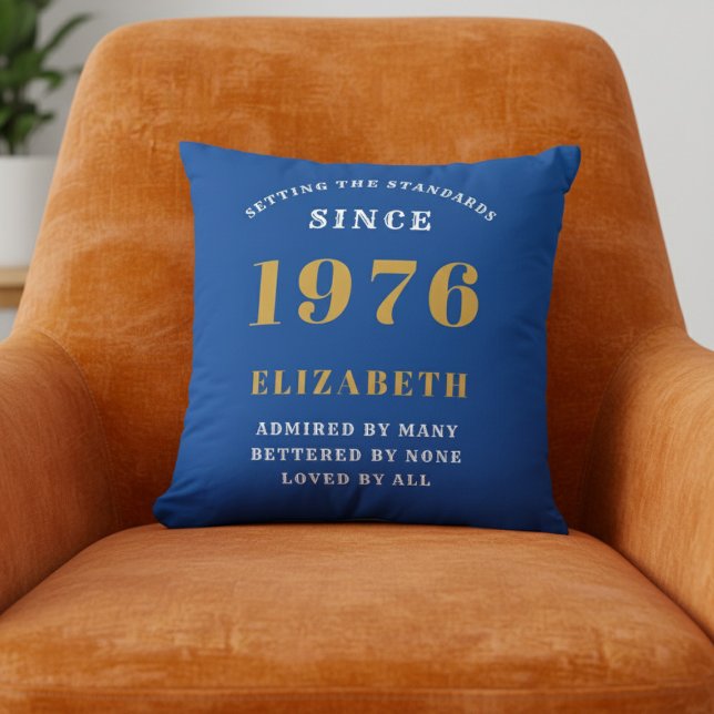Coussin 50th Birthday 1976 Add Name Blue Gold Personalized (1976 Blue throw pillow on orange chair.)