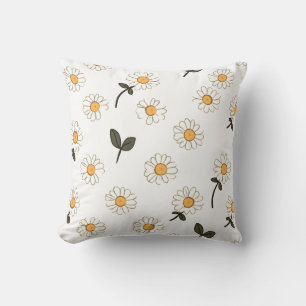 coussin à fleurs blanches avec centre jaune