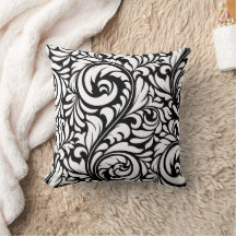 Coussin à motifs floraux noir et blanc