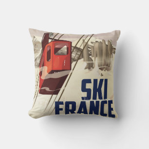 Coussin Affiche de voyage vintage sur le ski en France.