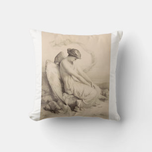 Coussin ange chrétien assis sur une pierre